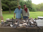 Ronny Glossup and Eddie Trapp with over a hundred pounds of blue catfish at the Doctors Creek fish cleaning table. Junior Larkin was also on the outing and took this picture. 