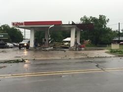 Joe Bob's Building damaged by strong thunderstorm. Photo by Chad Young.