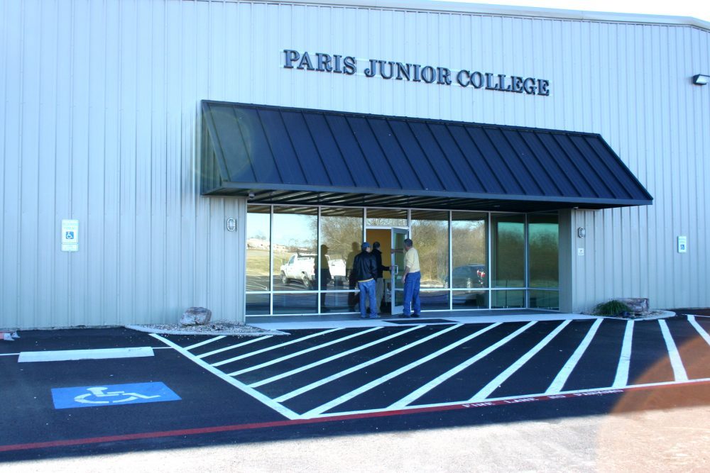 Workers were busy putting the final touches on the new Paris Junior College-Sulphur Springs Center campus building Friday. The signs were installed and faculty, staff and maintenance began moving from the old PJC-Sulphur Springs campus on Houston Street to the new location at 1137 East Loop 301 where spring semester classes will begin on Tuesday.