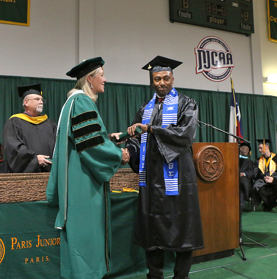 Joshua Leftrick of Sulphur Springs received his associate of science degree in engineering from Paris Junior College President Dr. Pam Anglin during the fall graduation ceremony.