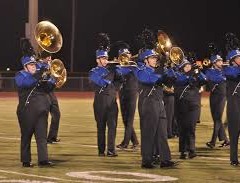 Wildcats Marching Band’s Percussion and Color Guard got a Four-Day Jump