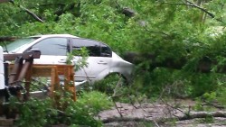 Car damaged by strong thunderstorm. Photo by Chad Young.