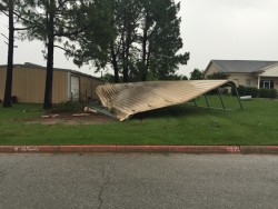 Carport damaged by strong thunderstorm. Photo by Chad Young.