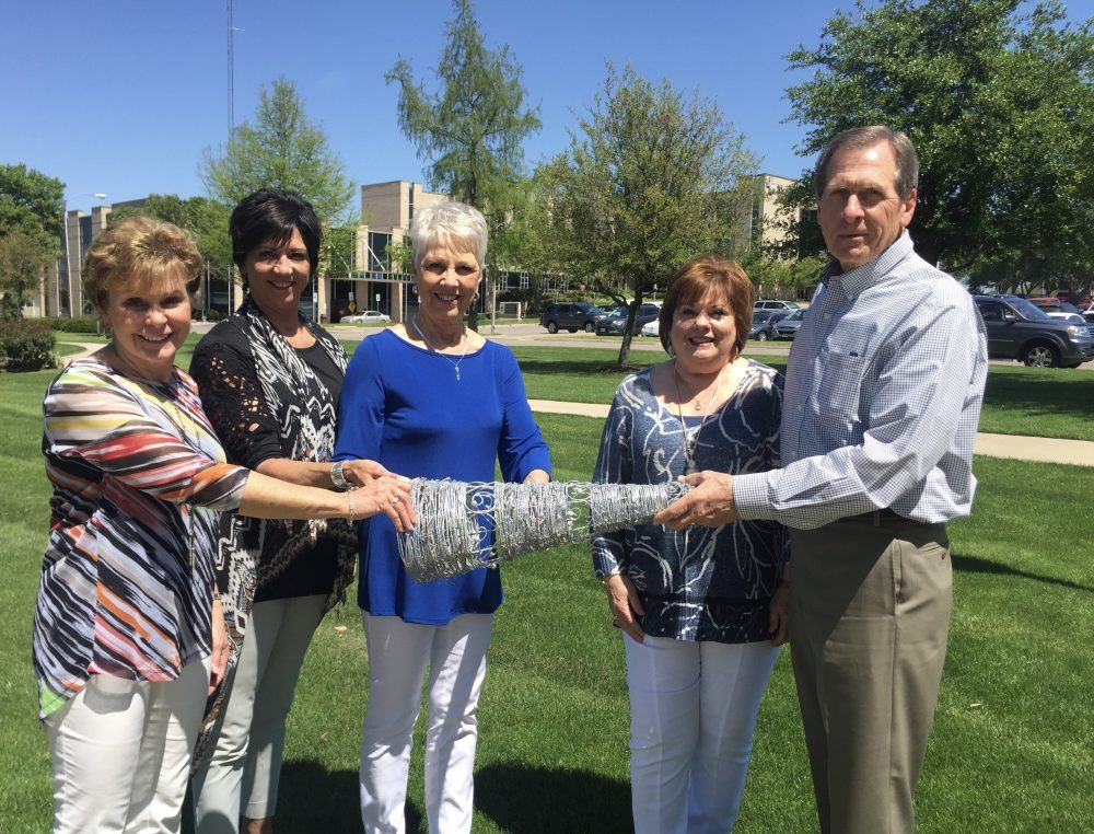 Gloria Mitchell, Donna Rudzik and Polly Swatsell, 2015-2016 Lights of Life Campaign & Gala Chairs have officially passed the chairmanship torch (Lights of Life signature gala tree) off to the 2016-2017 Chairs, Sam and Sher Sevier.