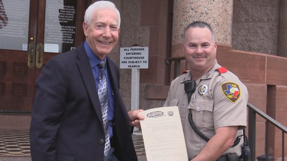 County Judge Robert Newsom and DARE Officer Kelly Wiser