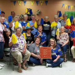 Local Senior Citizens Cheer on the Wildcats to a Homecoming Victory!