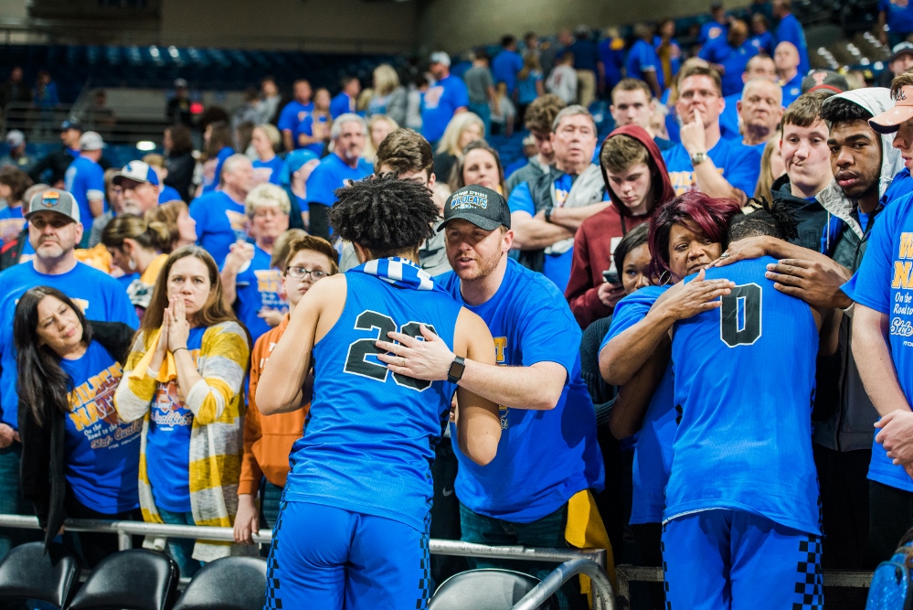 Sulphur Springs Wildcats Basketball Semifinals team hug fans