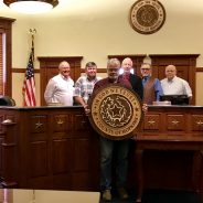 County Seal Donated For New Courtroom; Tractor Approved for Precinct 3