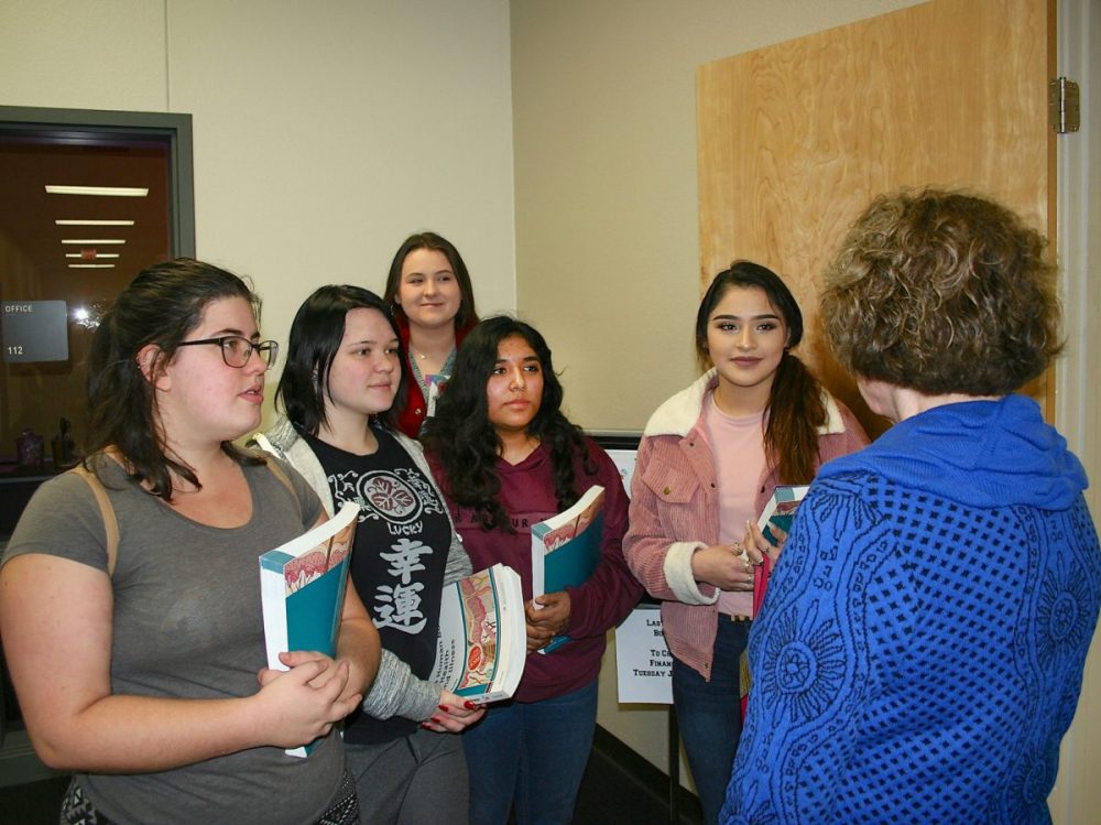 TESTING  PJC-Sulphur Springs Testing Center Clerk Kathy Martin, right, visits with North Hopkins High School dual credit students before they begin taking their TSI tests. The students, from left, are Ivy Fite, Ema Stevens, Nayra Torres, Molly Wiser and Selene Leon. 