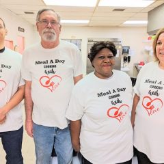 Hats Off to the Busy Volunteers at Meal a Day!