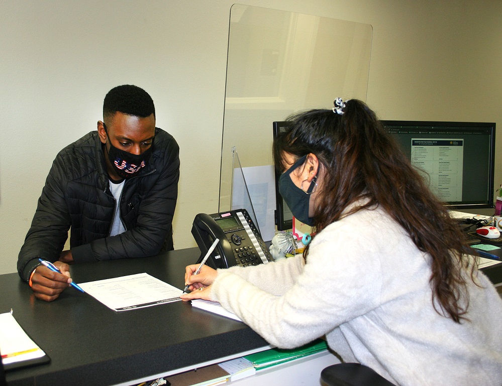 Paris Junior College Sulphur Springs student Iris Evans registering on first day back from holidays