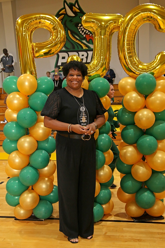 Photo cutline 2: PJC 1998 Homecoming Queen LaKeysha Brown returned to assist in crowning the 2023 PJC Homecoming King and Queen and received a recognition award for the 25th anniversary of her crowning as part of the ceremony.