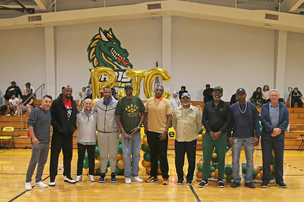 Photo cutline 3: All Dragon athletic alumni were invited to come down to center court to be recognized at halftime of the men's basketball game