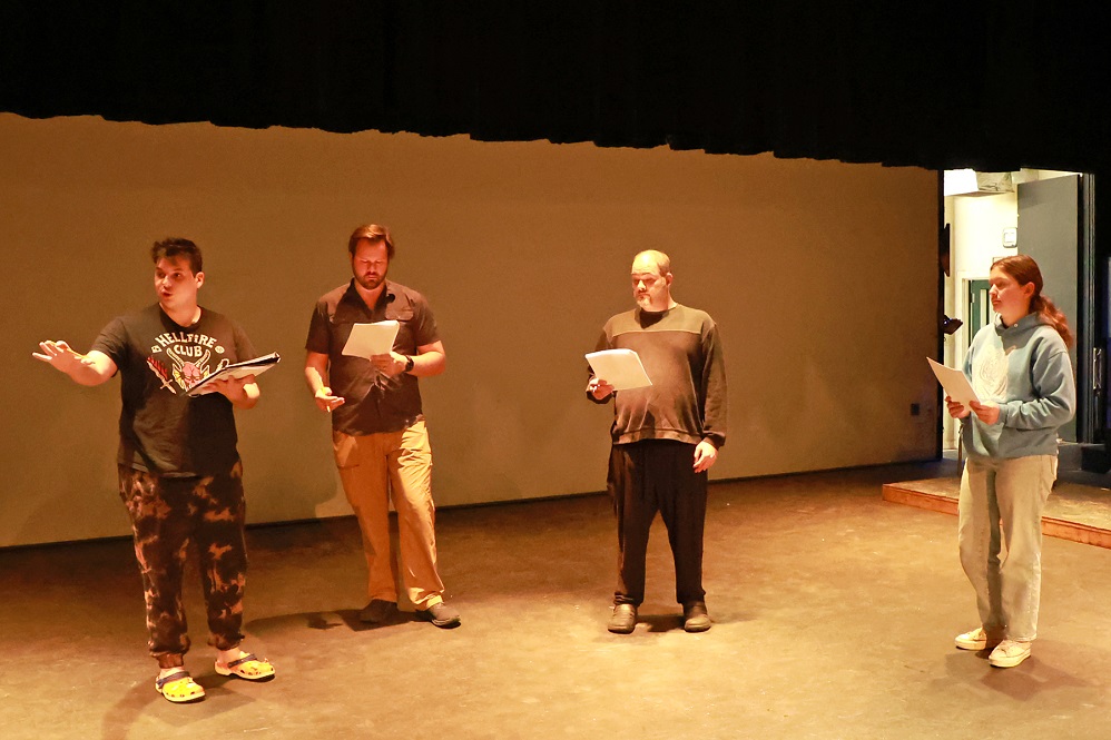 Playwright and director Ryan Smith (left), points out where the action should take place in "The Squatch of Avon, to (l-r) Derek Dacus, Dalen Hobbs, and Emilee Stowell.
