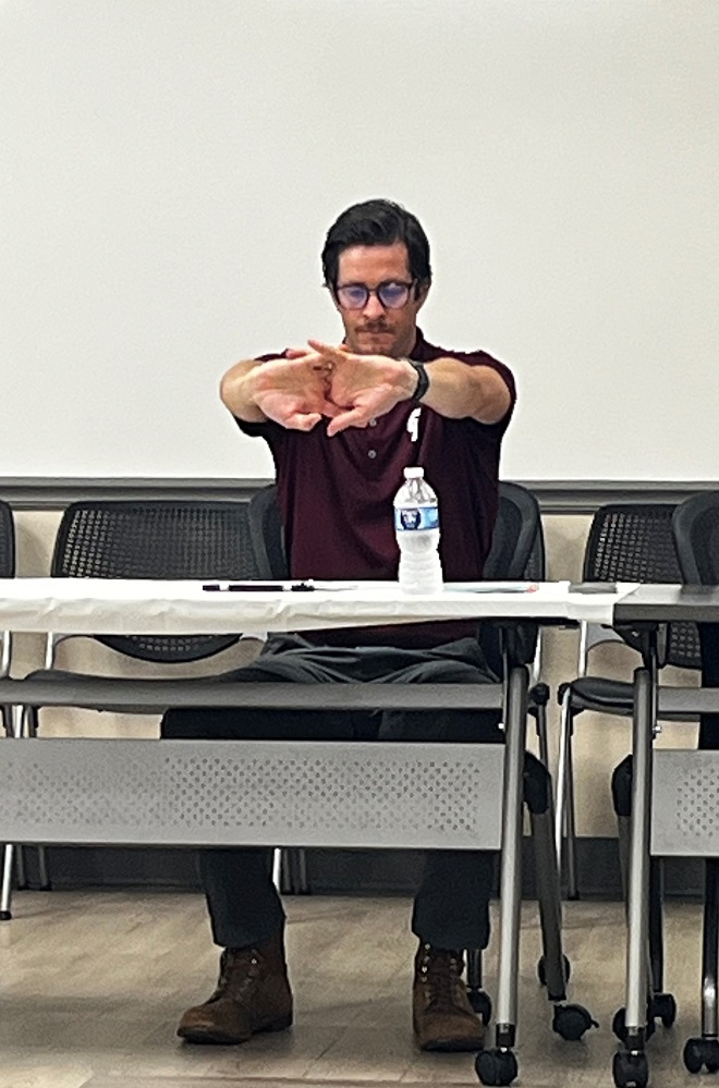 Foundation Board Member Garrett Glass does some arm and hand stretches as part of the Foundation’s Summer of Healthy Fun program. Visit the website, HCSummer25.GiveSmart.com, for all the details and events being offered.