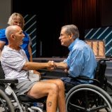 Governor Abbott Hands Out Strait To The Heart Funds To Leander Area Flood Victims