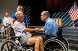 Governor Abbott Hands Out Strait To The Heart Funds To Leander Area Flood Victims