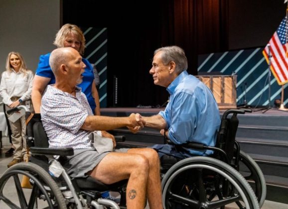 Governor Abbott Hands Out Strait To The Heart Funds To Leander Area Flood Victims