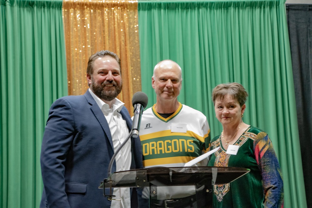 Alumni Honoree Deron Clark pictured with wife Saundra and Athletic Director, Clay Cox Paris Junior College November 2025