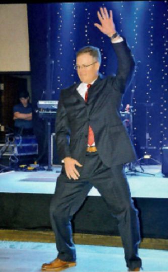 Caption this! Don Sapaugh strikes a pose or a dance move during A Decade of Diamonds Gala, held on January 23, 2016. Now we know why the local hospital has a thriving hip replacement department. Kids, don’t try this at home. Mystery solved! The year 2016 was the height of the Whip and Nae Nae dance craze. Don is showing how it is done. In all seriousness, please join the Hopkins County Health Care Foundation on January 24, 2026, for the 20th annual Gala raising money for new medical equipment for the surgical wing expansion at CHRISTUS Mother Frances – Sulphur Springs. Sponsorships and tickets are available at Gala2026.GiveSmart.com.