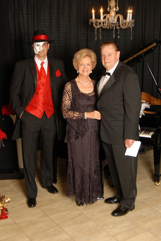 Patsy and Coy Johnson are joined by the Phantom of Opera (Mike Jumper) at the 2014 Gala. Patsy has also served the Foundation as a board member. Patsy and Coy are Heather’s in-laws and have championed the importance of great local healthcare and a strong hospital. To enjoy the 20th anniversary Gala celebration, get your tickets at Gala2026.GiveSmart.com.