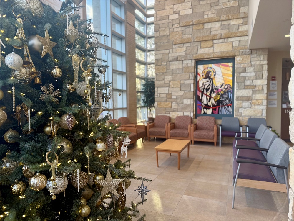 The CHRISTUS Mother Frances Hospital – Sulphur Springs Christmas tree stands watch over the lobby as patients and families enter and leave. The majestic tree is adorned with white and gold ornaments. Soon the glass windows will feature snowflakes honoring friends and family. To learn more, visit Snowflake2025.GiveSmart.com. Photo courtesy of Emily Nance.