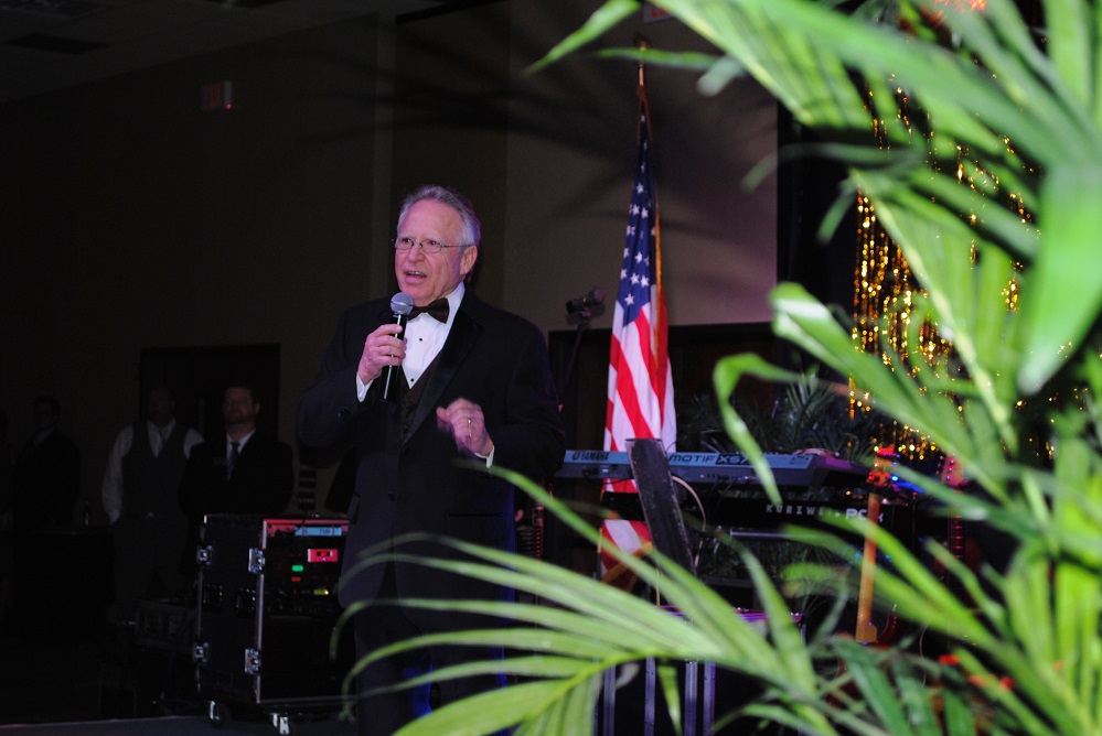 PR 31 Photo 2 – Dr. Bill Dietze, one of the original nine members of the Hopkins County Health Care Foundation Board of Directors, led the prayer at the start of the 2015 Gala. The tradition of opening the night with a prayer began at the second Gala in 2007 and still continues. To get tickets or to sponsor the 2026 Gala, “A Celebration of Twenty Years,” go to Gala2026.GiveSmart.com.